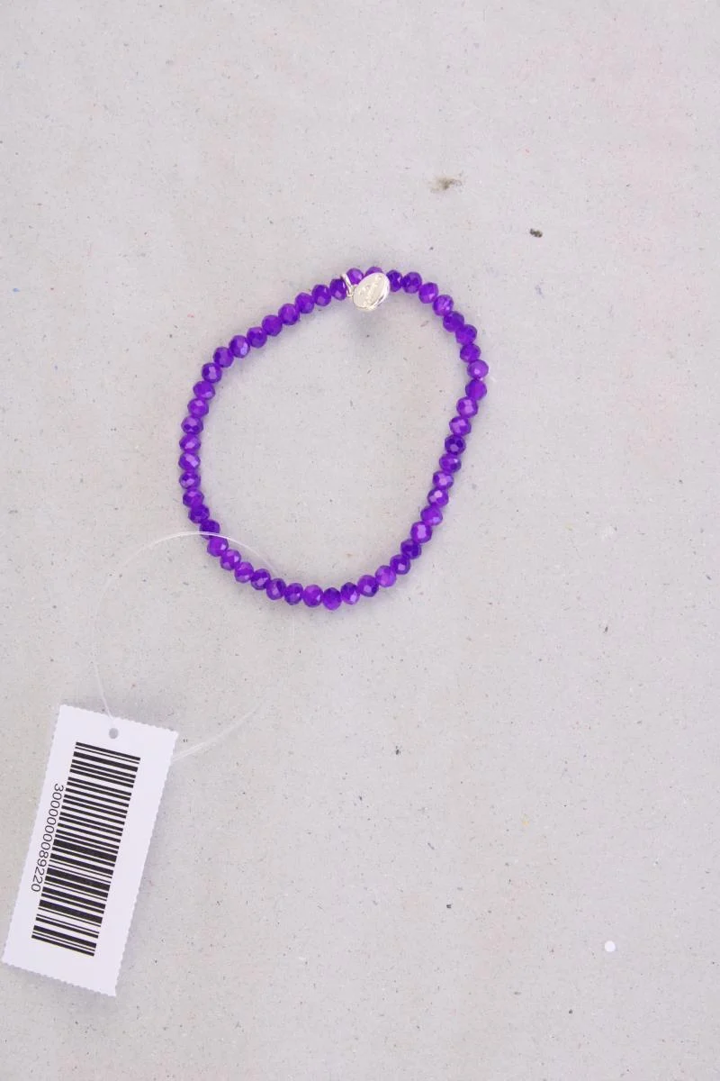 Giuno Armband neuwertig lila