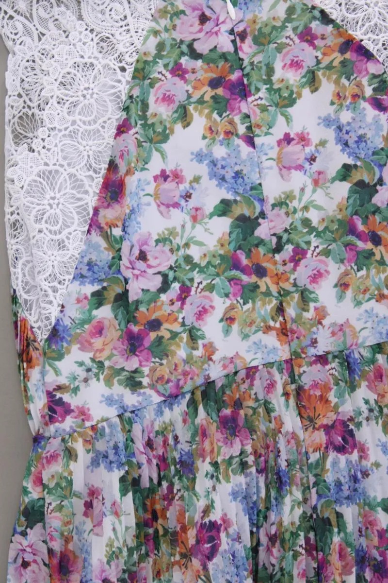 Asos Midikleid Gr. 40 mit Blumenmuster Ärmellos mehrfarbig aus Polyester